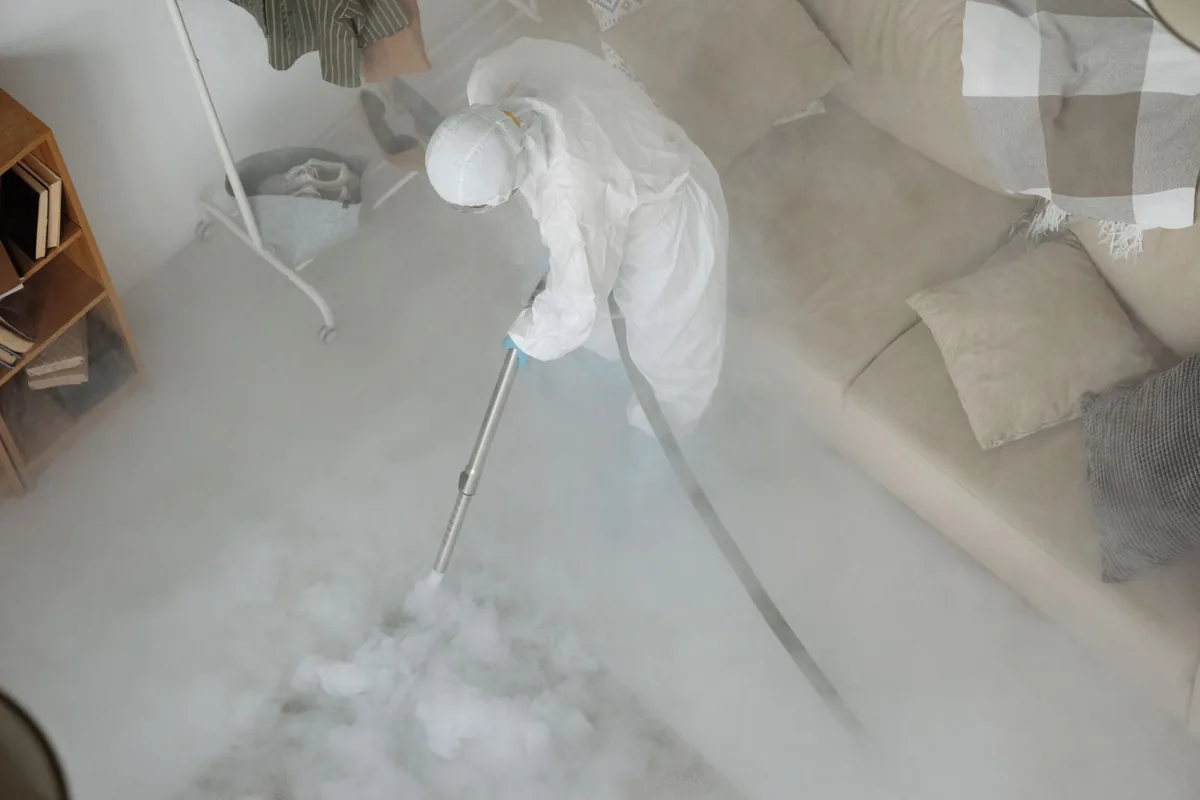 Biohazard cleanup technician in protective equipment, Sunset Cliffs, San Diego, CA